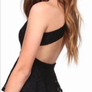 Criss cross lace back peplum top